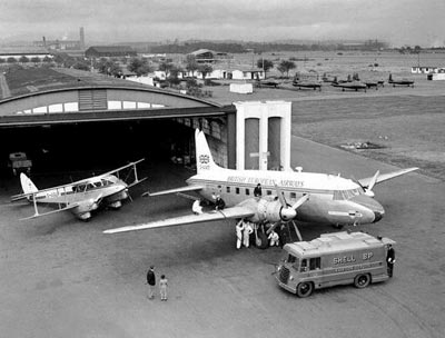 View from the old terminal towards the rear set of Belfast Truss hangars with DH.89A G-AGUR and Vickers Viking G-AIVD