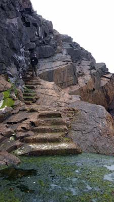 This picture of the West Landing stage shows how the sea has partially washed away the steps which can be treacherous with the seaweed underfoot.