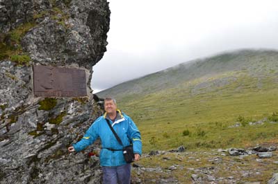Author Keith McCloskey at the Dyatlov Pass with Kholat Syakhl (Dead Mountain) in the background